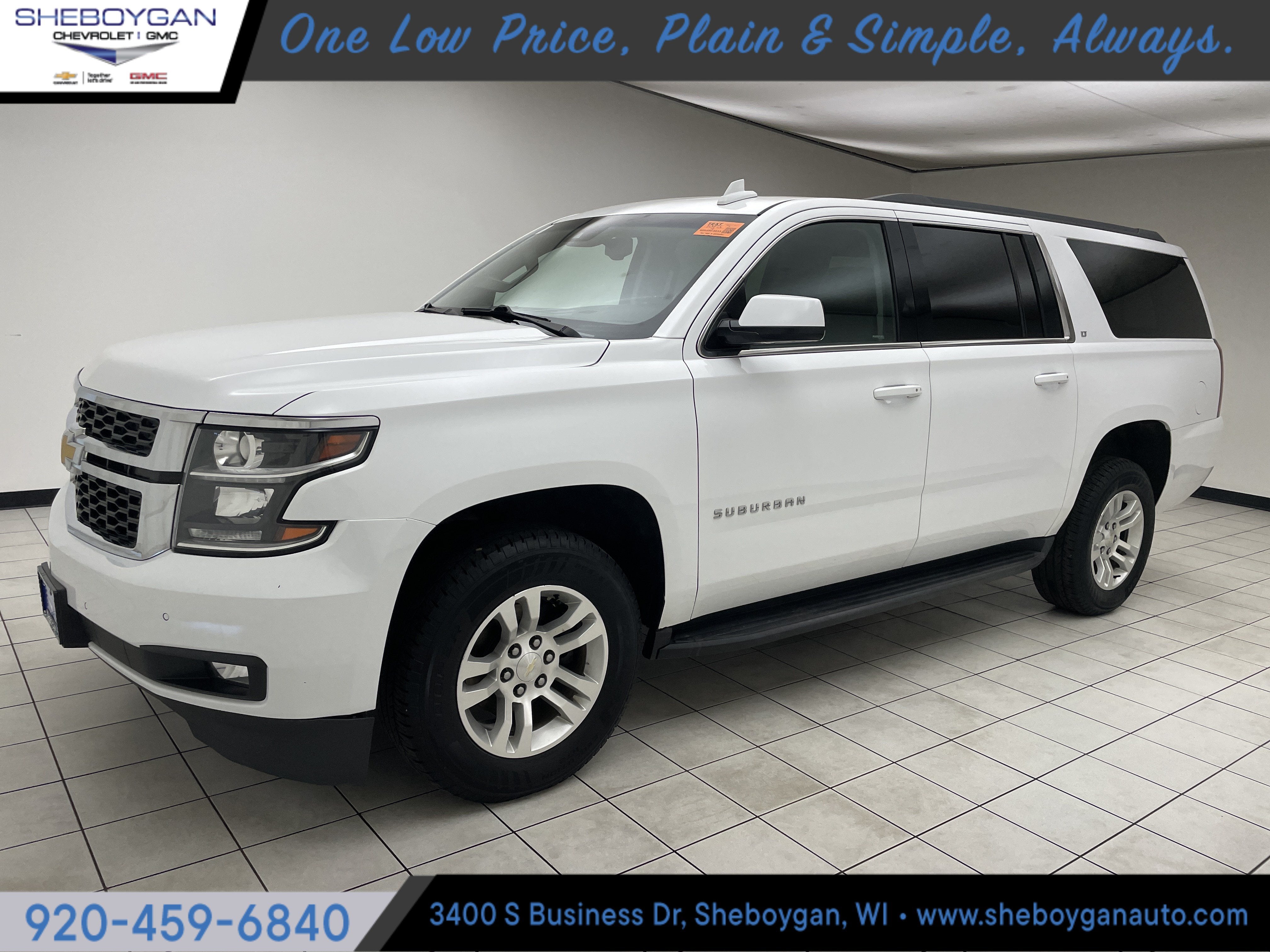 2019 Chevrolet Suburban LT in Summit White — front three-quarter view