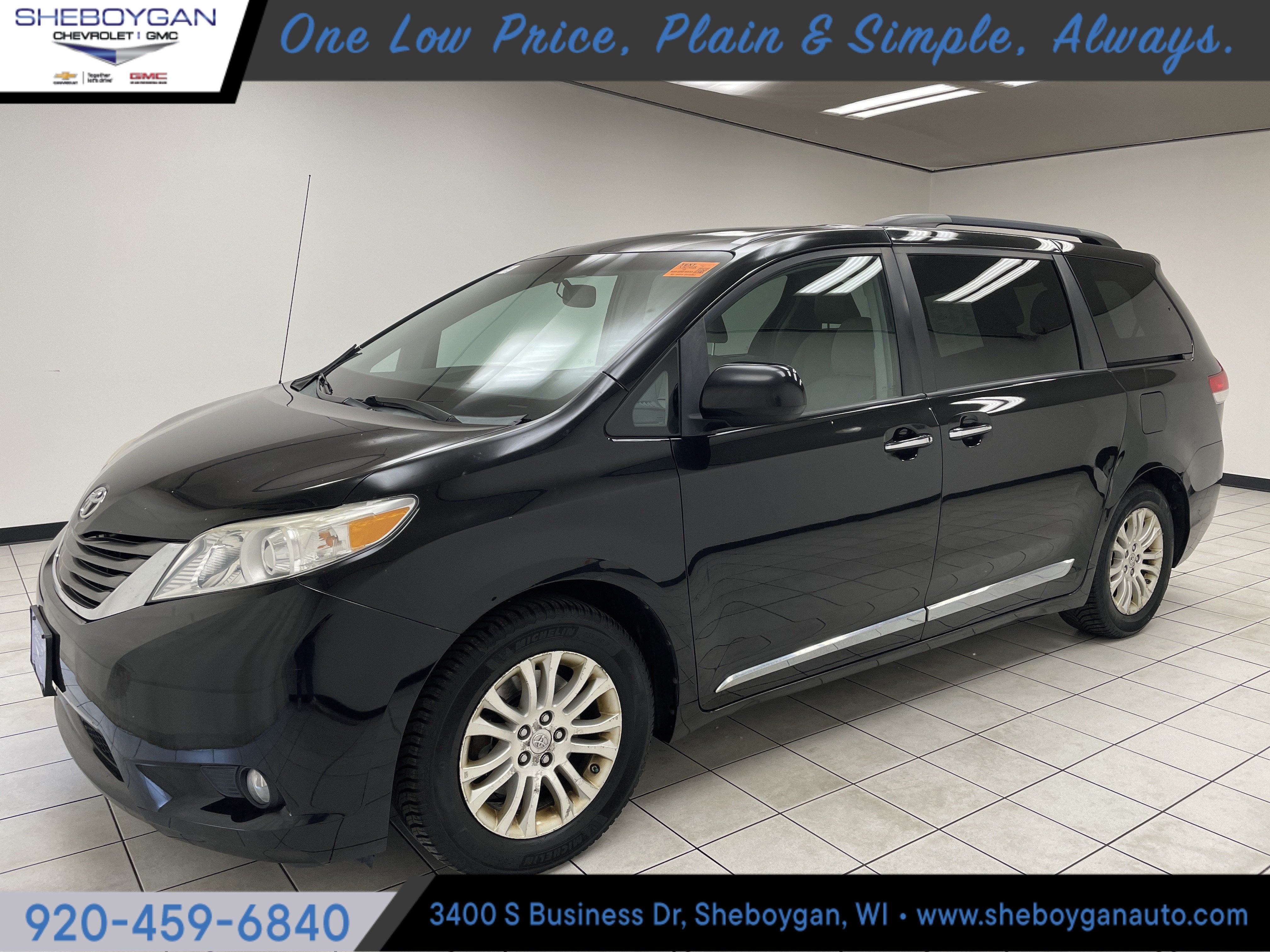 2013 Toyota Sienna XLE V6 8 Passenger in Black — front three-quarter view