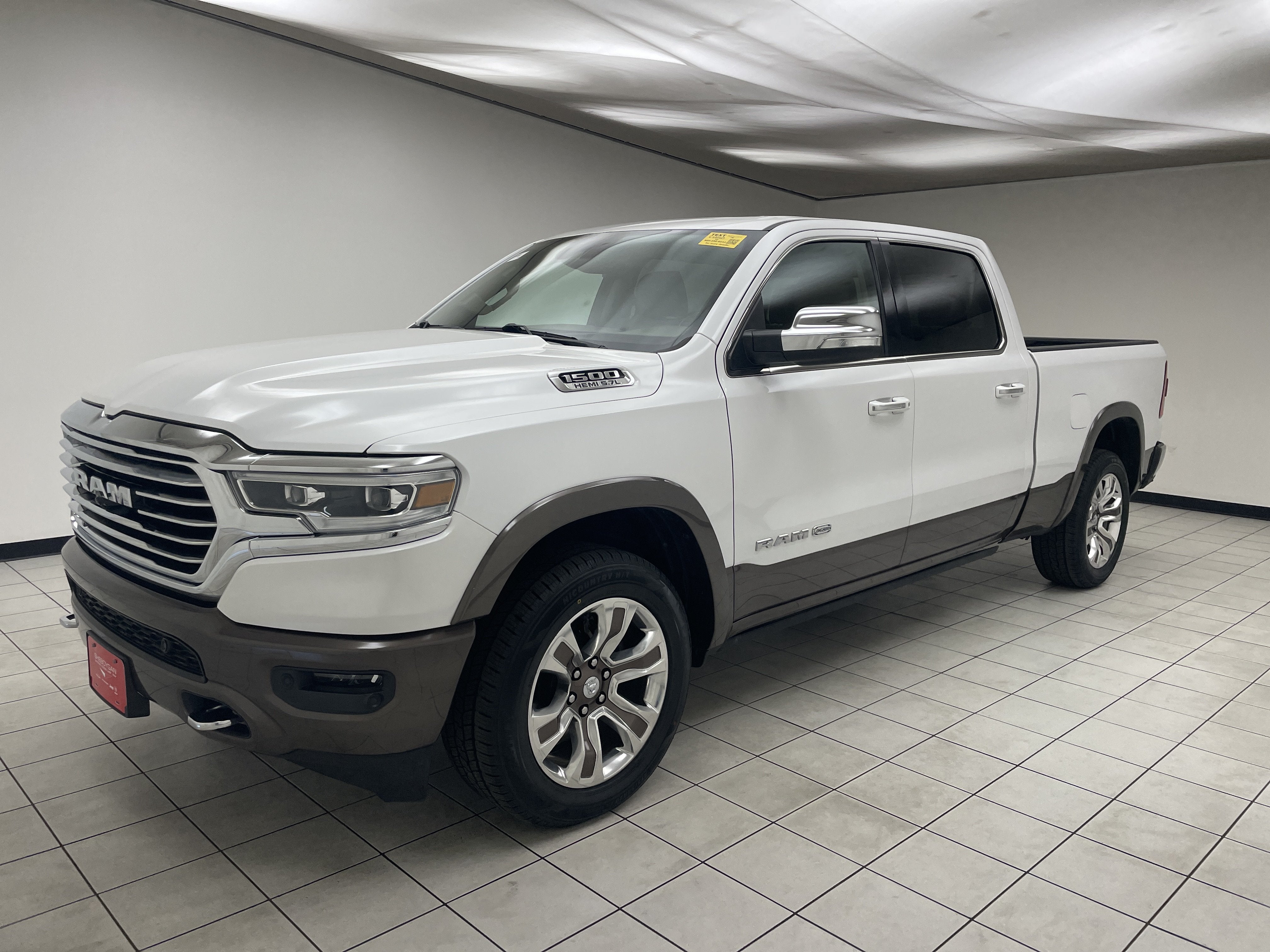 2020 RAM 1500 Longhorn in Ivory White Tri-Coat Pearlcoat — front three-quarter view