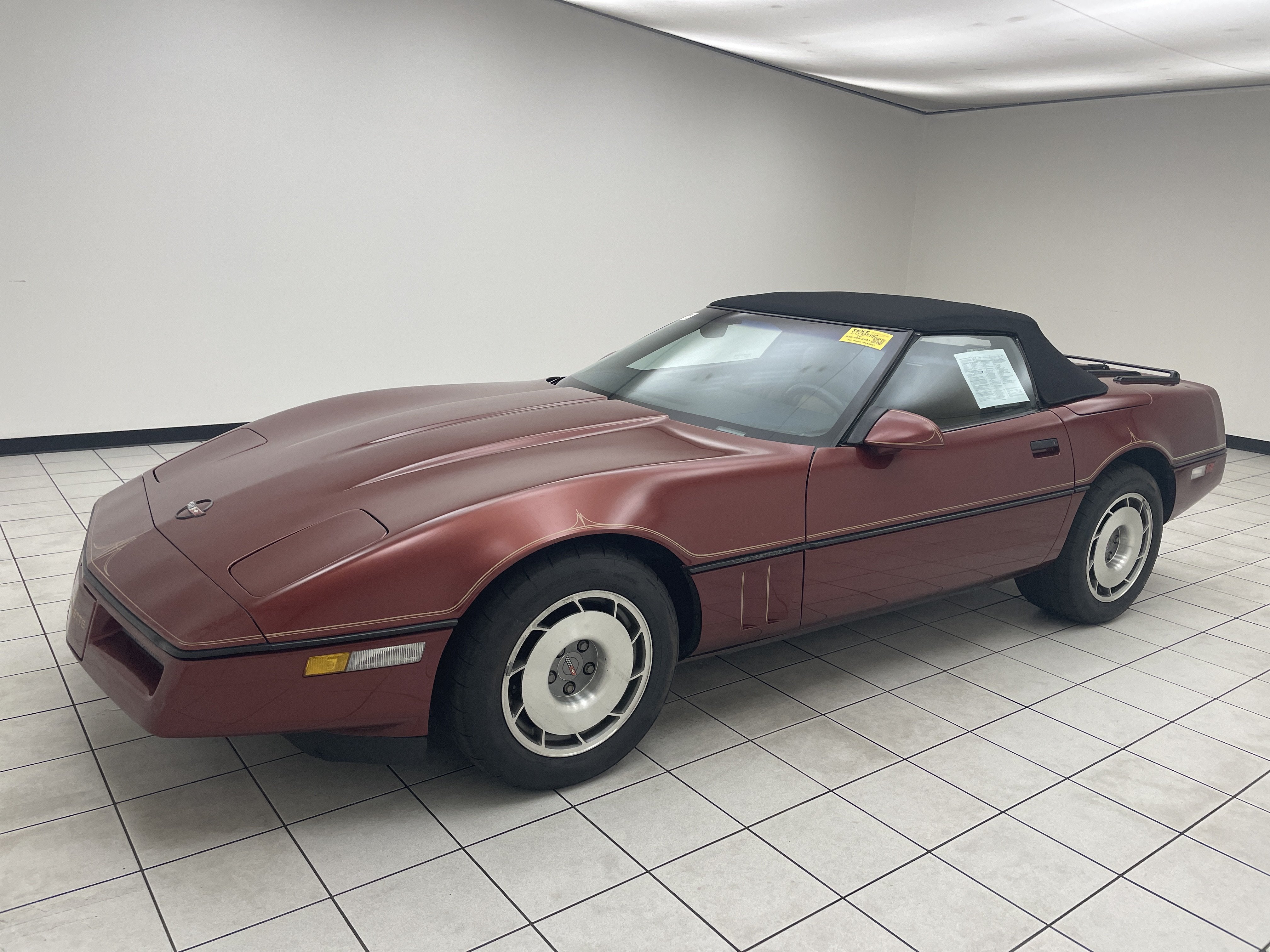1987 Chevrolet Corvette Base in Maroon — front three-quarter view