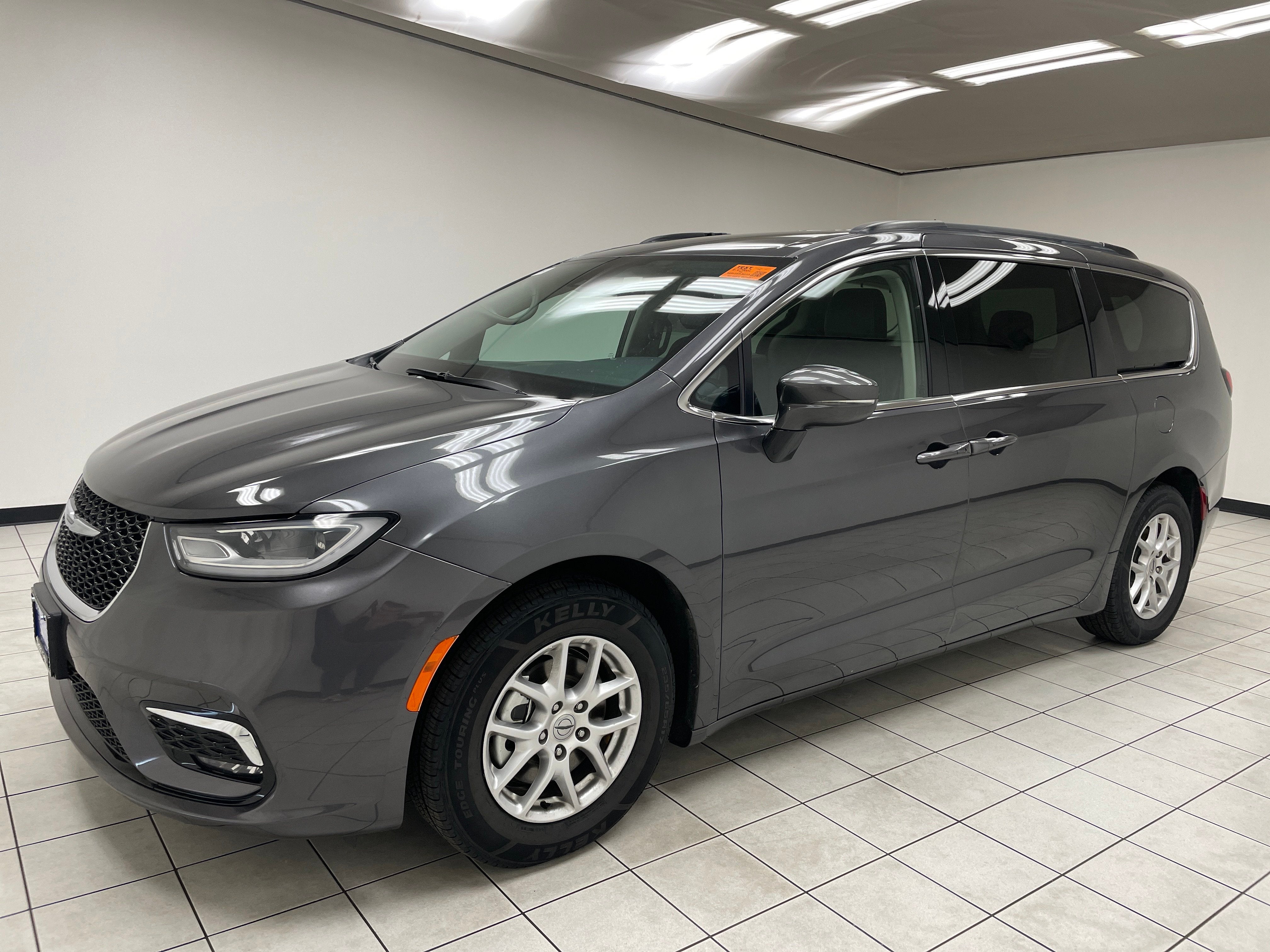 2022 Chrysler Pacifica Touring L in Granite Crystal Metallic Clearcoat — front three-quarter view