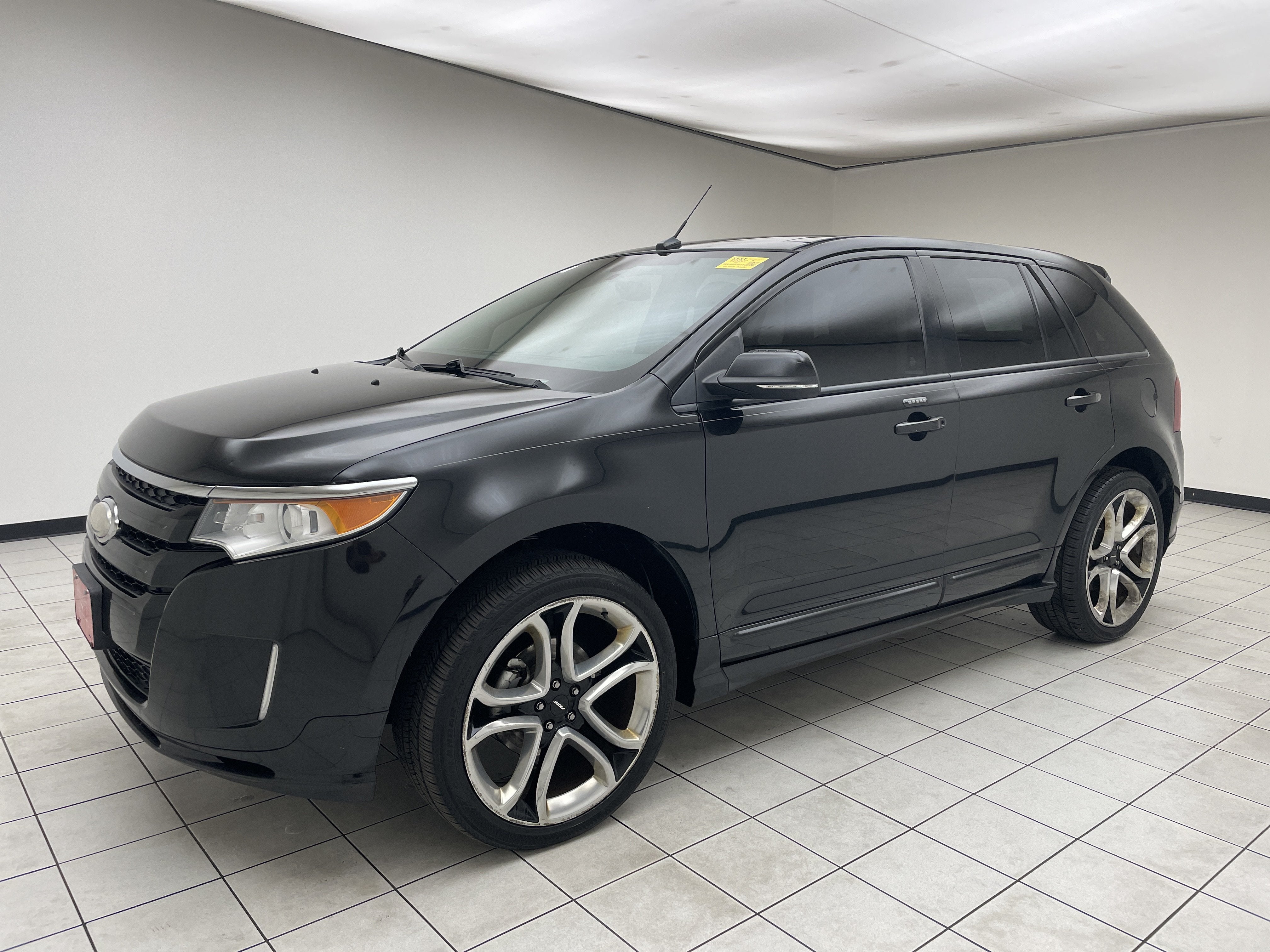 2013 Ford Edge Sport in Tuxedo Black Metallic — front three-quarter view