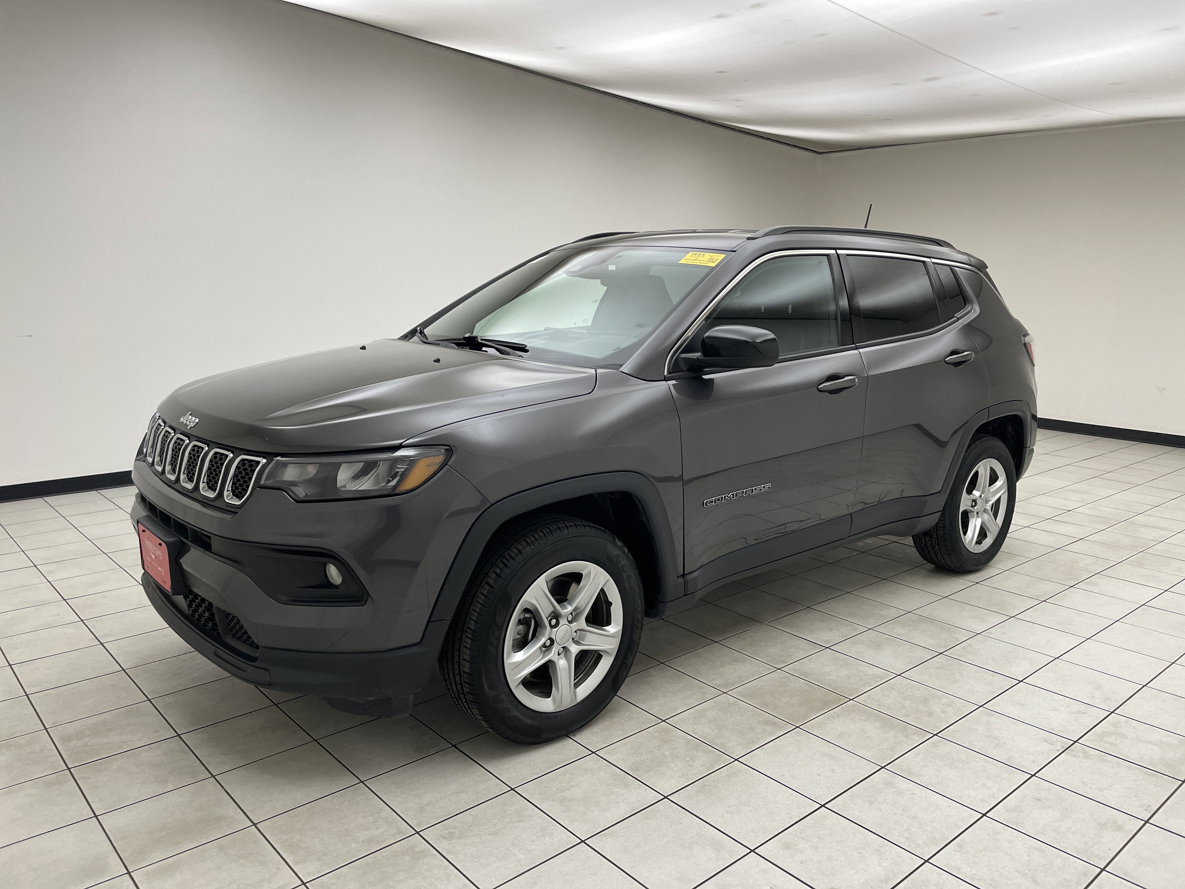 2024 Jeep Compass Latitude 4x4 in Gray — front three-quarter view